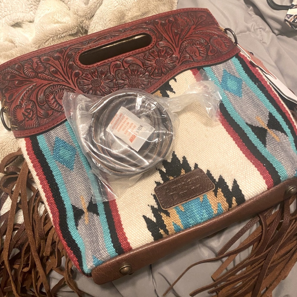 American Darling purse with fringe and  straps never used
